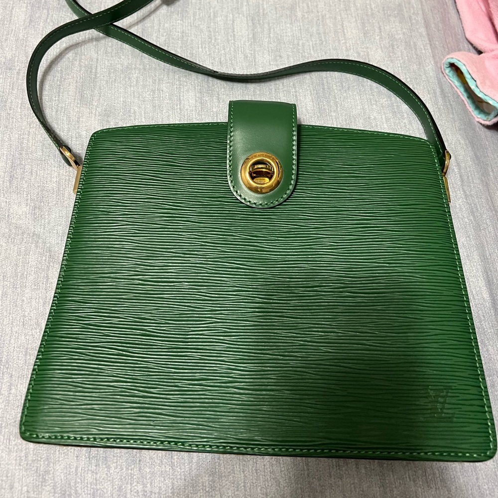 Louis Vuitton brand new vintage without tag cross body/hand bag, capucines